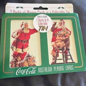 Coca Cola vintage playing cards in collectible tin. 2 decks still wrapped. 1995